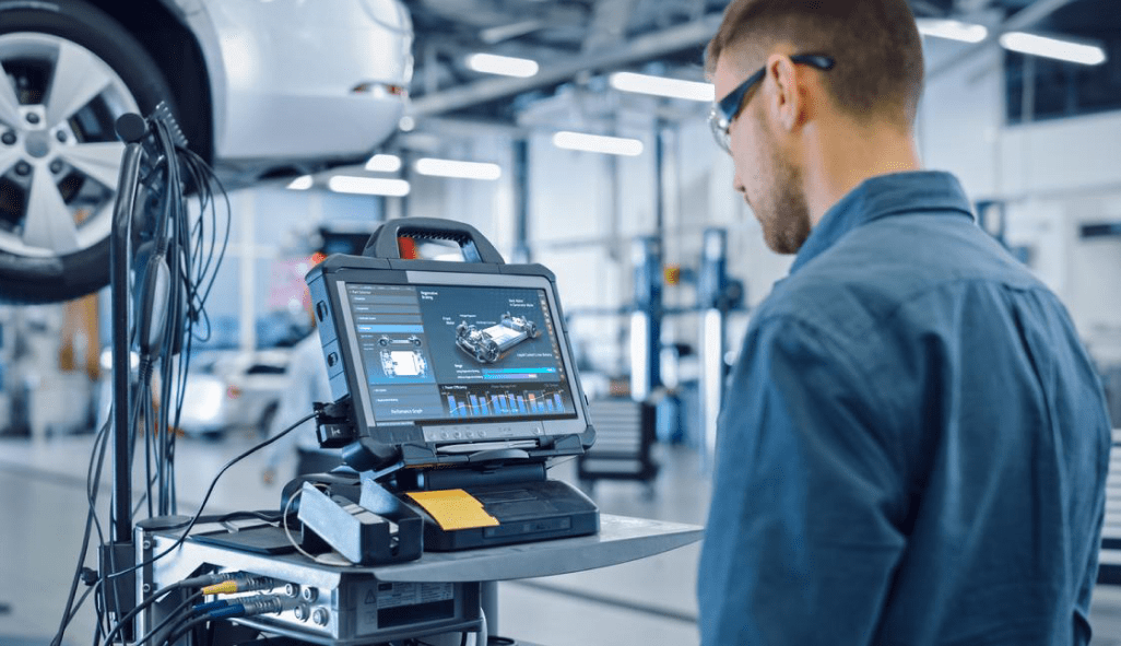 A Person having close look on blueprint of Car Manufacturing