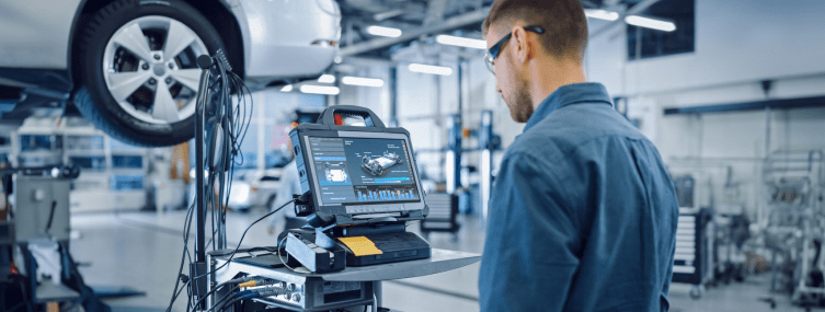 A Person having close look on blueprint of Car Manufacturing