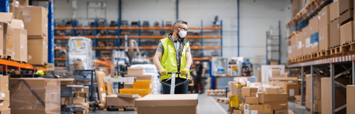 Worker moving a box